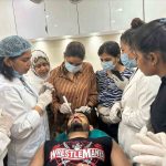 Medical professionals demonstrating a facial dermatology procedure in a clinical training session