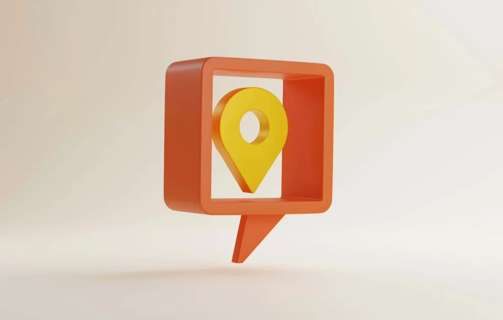 3D location pin inside an orange speech bubble representing multilingual localization and location-based communication services