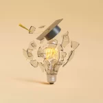 Broken light bulb with a glowing filament and graduation cap symbolizing innovation, intellectual property, patent translation, and global knowledge transfer.